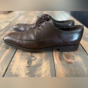 Brown Salvatore Ferragamo Italian Leather lace-up dress shoe.